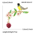 Spilla uccello in smalto colorato con fiori e ciondolo a bacca rossa su lega dorata - Grigio (5656-GY)
