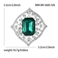 Spilla vintage con cristallo verde taglio smeraldo, montatura argento e strass bianchi - Verde