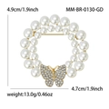 Elegante broche de corona dorada con perlas blancas y detalle de mariposa de cristal - Dorado