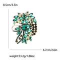 Grande spilla vintage con cristalli verdi e base dorata, altezza di 8,5 cm - Verde