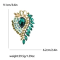 Vintage gold brooch with large green waterdrop crystal, 9.1cm high and 6.2cm wide - Green