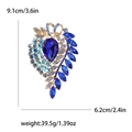 Retro gold alloy brooch with blue pear-shaped crystal and AB rhinestones, 9.1cm tall - Blue