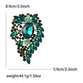 Elegant teardrop alloy brooch with large emerald green crystals and vintage gold finish - Green