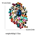 Vintage gold alloy brooch with large navy blue crystal and multi-color rhinestones - Multi-color