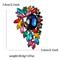 Vintage alloy brooch with large oval blue stone and colorful rhinestone accents - Rainbow