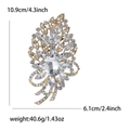 Spilla in lega dorata con cristalli trasparenti e design botanico, dimensioni 10,9cm x 6,1cm - Base Oro Bianco