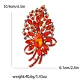 Spilla elegante placcata in oro con grande gemma arancione e strass colorati brillanti - Rosso