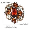Vintage gold alloy flower brooch featuring amber glass stones and colorful crystals - Brown