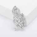 Elegant silver flower leaf brooch with rhinestones displayed on a white platform - Silver