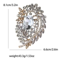 Luxury gold vintage glass brooch with large crystal main stone and dimension measurements - Gold