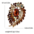 Vintage gold alloy brooch with large oval brown stone and dimensions in inches - Coffee