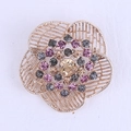 Golden alloy flower brooch with intricate filigree petals and multi-colored rhinestones - Coffee