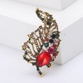 Broche de hoja vintage dorado con diamantes de imitación y gema roja de gota - Rojo