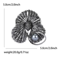 Broche vintage de aleación gris oscuro con diamantes de imitación negros y perla - Color gunmetal