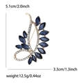 Spilla vintage piuma d'oro con gemme blu e strass bianchi per abiti eleganti da donna - Oro