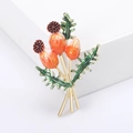 Elegante spilla a cardo dorata con smalto verde e arancione per accessori da abito - Arancione-0444