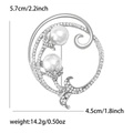 Silver flower brooch with pearls and crystals, dimensions 5.7cm by 4.5cm and 14.2g weight - Silver