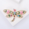 Vintage gold dragonfly brooch with colorful enamel flowers and shimmering rhinestones - Gold