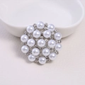 Elegant silver alloy brooch with white faux pearls and sparkling crystal rhinestones - Silver