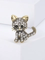 Dettaglio macro di una spilla a gatto vintage dorata con strass e occhi di pietre nere - Base Dorata Strass Bianco (0732)