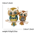 Fashionable owl duo brooch with rhinestones and gold tree branch branch design - Colorful