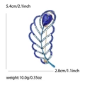 Elegante broche de hoja con cristales azules y pedrería, tamaño de 5,4cm por 2,8cm - Azul
