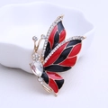 Elegante vergulde vlinderbroche met rood en zwart emaille vleugels en fonkelende zirkoon - Rood