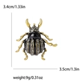 Spilla a forma di scarabeo carina con smalto nero e strass lucidi 3,4x3,5 cm - Nero