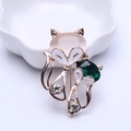 Vintage Fuchs-Brosche aus Gold mit rosa Katzenaugenstein und smaragdgrünen Kristallen - Doppeltes Fuchs-Design / Grün