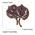 Vintage copper leaf brooch with magenta rhinestones and hollow design, 5.4cm size - Purple