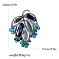 Dettagli dimensionali della spilla vintage con strass blu e base in argento - Blu
