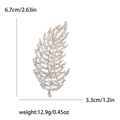 Broche feuille dorée avec cristaux blancs et dimensions détaillées 6,7 cm x 3,3 cm - Doré