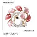 Eleganter Pfauenbrosche mit rosa Emaille-Blättern und Kristallen in Goldoptik - Rosa