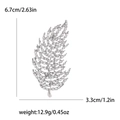 Broche élégante en forme de feuille évidée avec cristaux, dimensions 6,7 cm sur 3,3 cm - Argenté