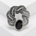 Vintage style silver brooch with oval black gemstone and pave-set rhinestones - Black