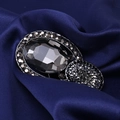 Elegant vintage brooch with large oval black crystal and pave set dark diamonds - Black