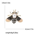 Emaille-Bienenbrosche mit weißer Perle und Strasssteinen, 3.9cm x 4.2cm Accessoire - Grau