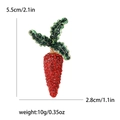 Fonkelende wortelvormige broche met rode en groene strassteentjes, 5,5 cm hoog - Rood