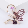 Exquise broche fée dorée et violette avec cristaux et perle sur socle blanc - Violet