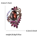Spilla vintage in lega con cristalli rossi, dimensioni 6,3 cm di altezza e 4,4 cm di larghezza - Viola