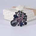 Vintage starfish brooch with multicolor crystals and deep blue rhinestones on silver base - Pink