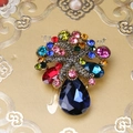 Vintage flower basket brooch with colorful crystal inlay and water-drop blue stone - Gold