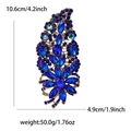 Spilla elegante a fiore da 10,6 cm in lega dorata con strass di cristallo blu scuro - Blu