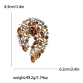 Vintage gold brooch with amber crystals and multi-color rhinestones in 8.9x6.2cm size - Brown
