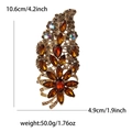 Vintage gold brooch with amber crystals and measurement scale showing dimensions - Brown