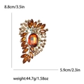 Vintage golden alloy brooch with amber glass stones and rhinestones for women suit - Brown
