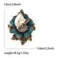 Vintage gold-plated flower brooch with teal and burgundy rhinestones and amber crystal - Coffee