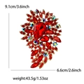 Spilla vintage in lega dorata con strass rosso rubino e altezza di 9,1 cm - Rosso