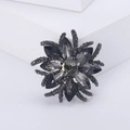 Elegant dark grey floral brooch featuring marquise crystal petals and gunmetal finish - Gun Black 1025