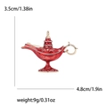 Broche lampe d'Aladdin en émail rouge vintage avec détails dorés et dimensions - Rouge